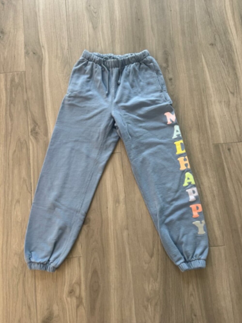 Madhappy blue sweatpants with multicolor logo